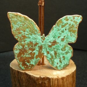 Broche papillon oxydée