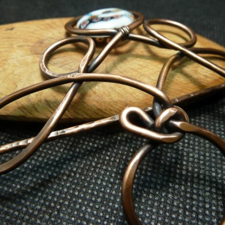3.310.6 – broche cuivre nu perle